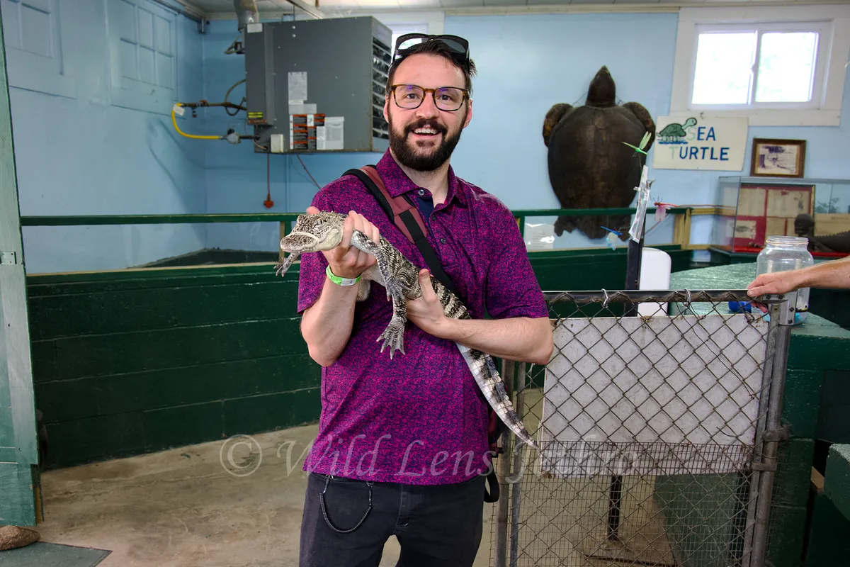 Paul Jethro Holding Baby Alligator