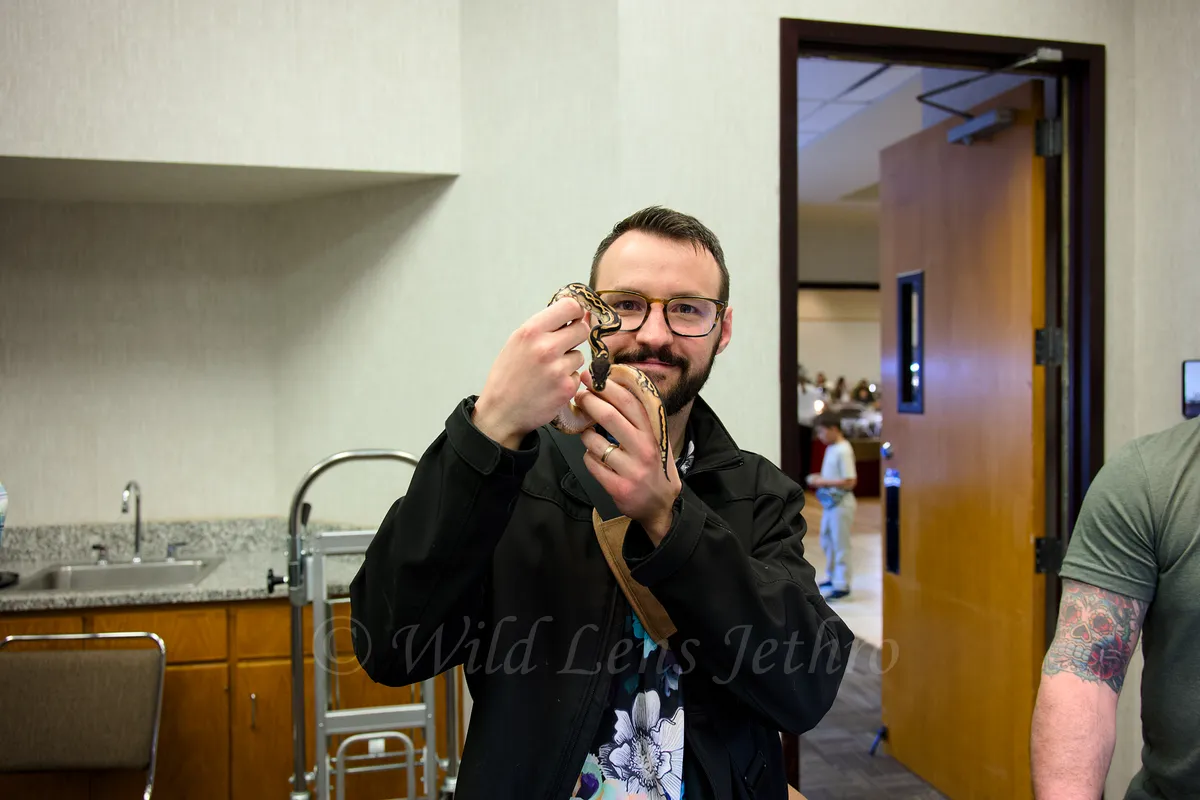 Paul Jethro Holding A Ball Python
